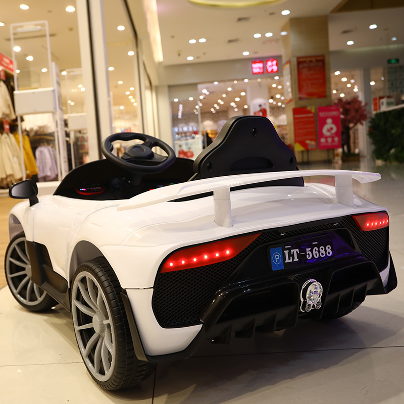 380*2 Motor 2.4g RC Electric Car Opening Door and 4 WHEELS Ride On for Kids aged 2-10 Years