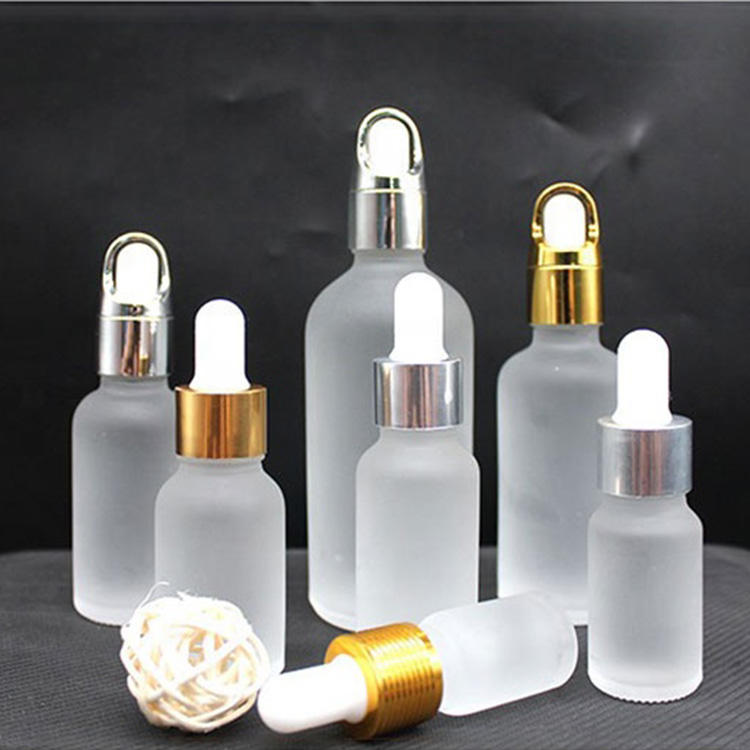Custom Glass Cosmetic Serum Bottle 30ml 1oz Frosted Round Shoulder Dropper Bottle For Essential Oils