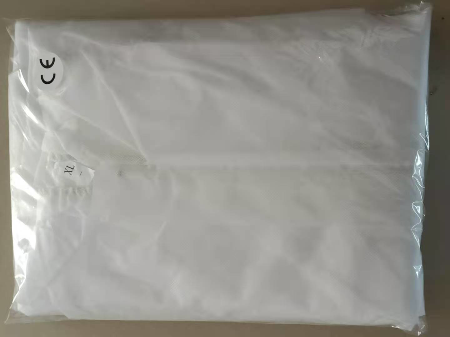 Industrial M L XL 2XL Disposable Isolation Gowns With SMS 50GSM Material