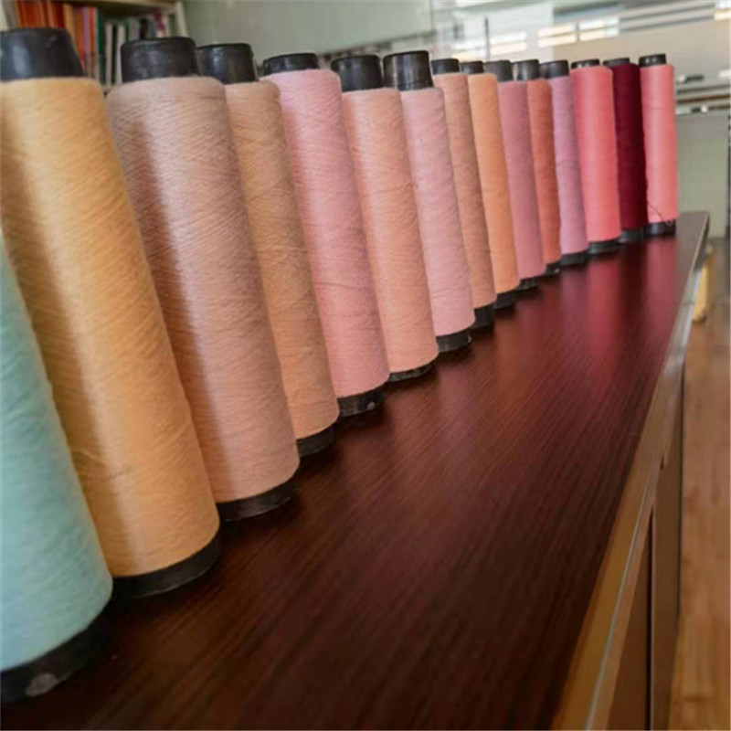 Very soft and flexible knitted yarn 28S/2 VISCOSE NYLON PBT 200 colors of core-spun yarn for flat machine sweater