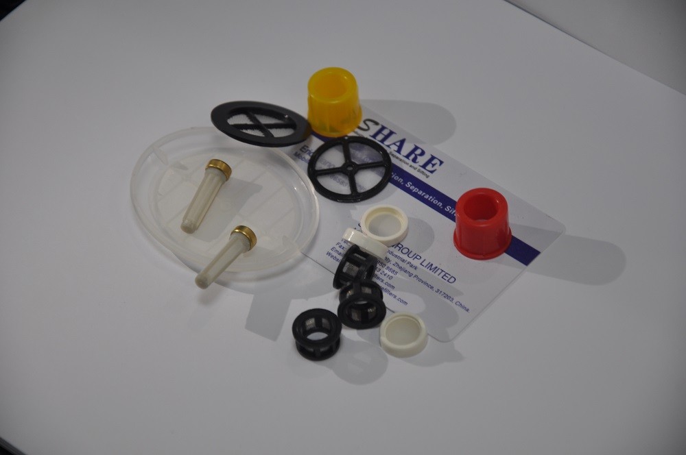 Molded Plastic Filters For Automotive Industry Filtration Parts molded with synthetic mesh and metallic meshes