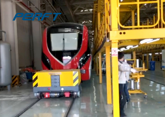 Rail powered transfer flat cart special for traction and dragging of large machinery
