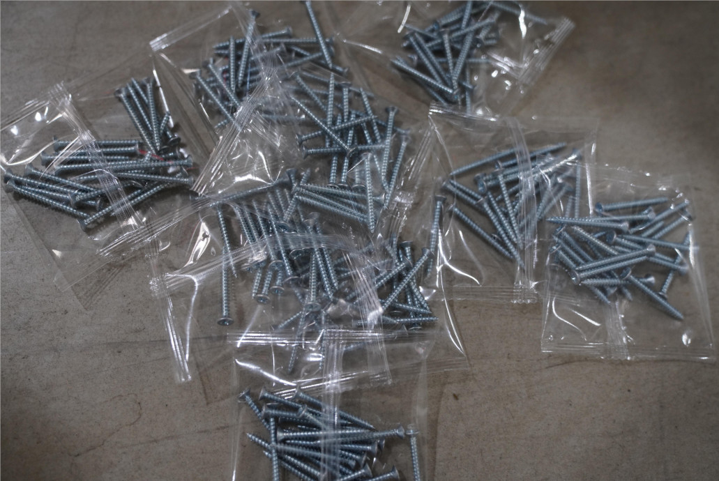 CE Hardware Screw Counting Packing Machine Nuts Bolts Counting And Packaging Machine