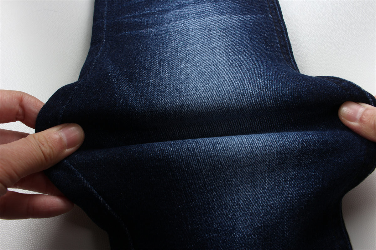 Hot sell 9.5 oz high stretch warp slub denim fabric for jeans