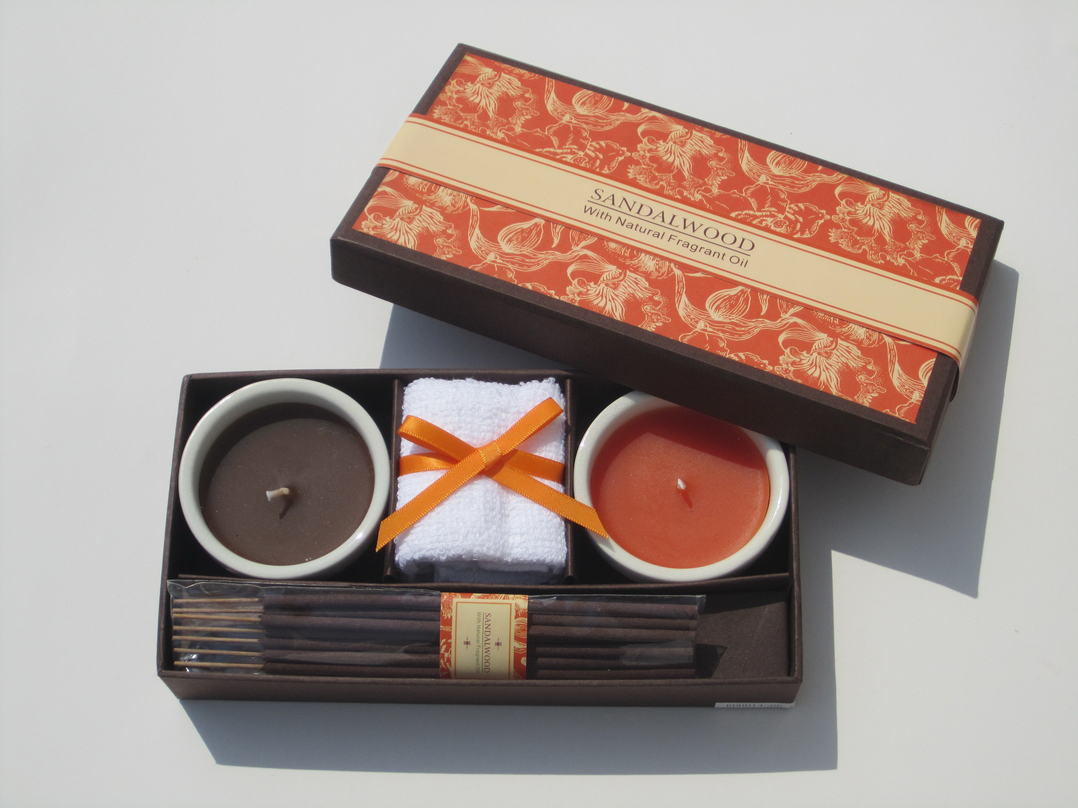 2pk Orange & brown scented ceramic candle with printed label packed into gift box