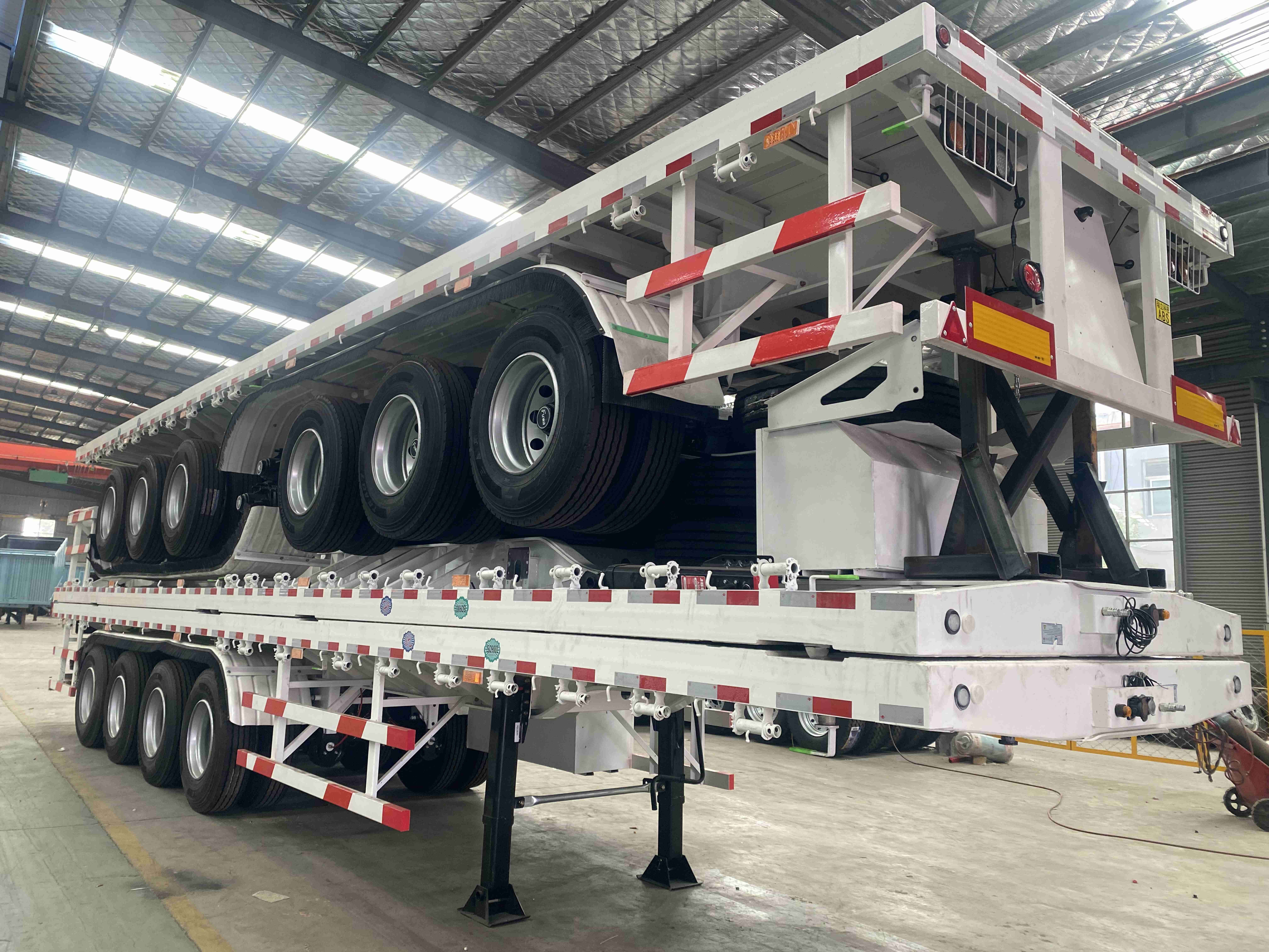 30 40 50 Ton 2 3 4 Axles Flatbed Semi Truck Container Trailer 48 Ft 40 Ft 20 Ft Flatbed Trailer for Sale