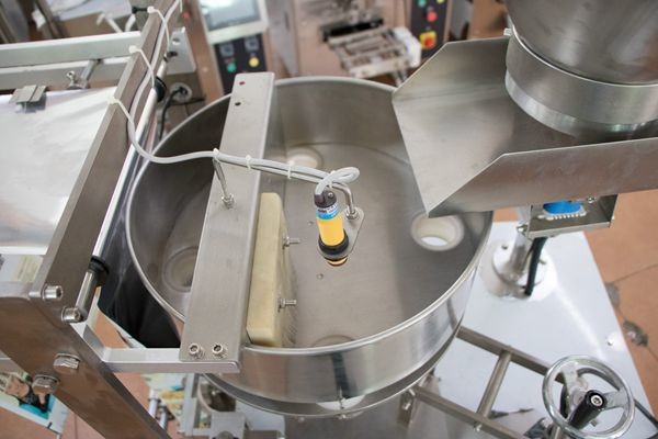 granular packing machine cashew nut dry fruits packaging machine volumetric cup dosing machine volumetric cup dosing