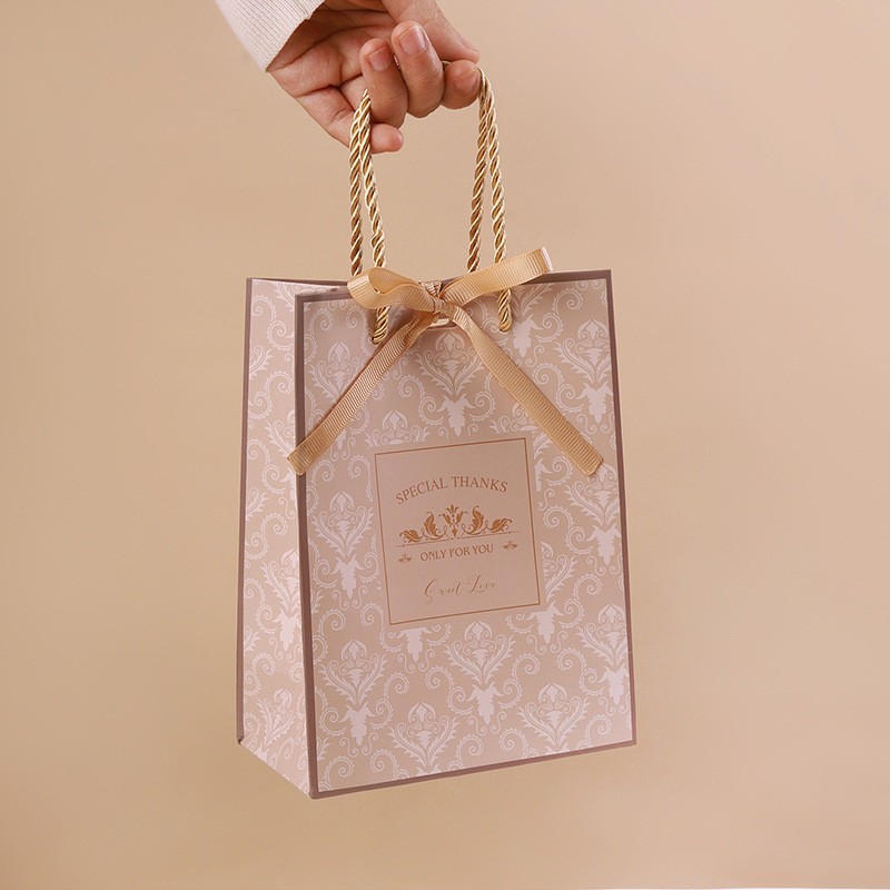 Cattle Paperboard Custom Kraft Paper Handbag Cosmetics Packaging Gift Bags With Cowhide Rope