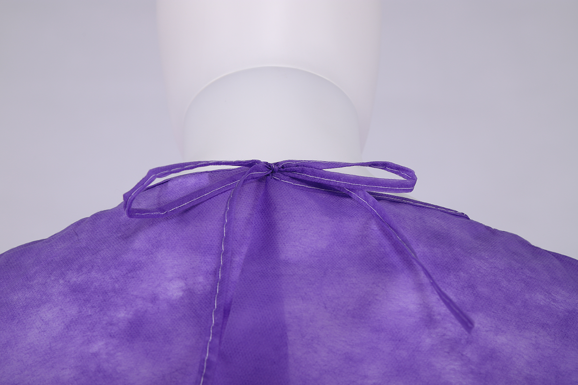 Round Neck Disposable Reinforced Surgical Gown Fluid Resistant Purple Isolation Gown