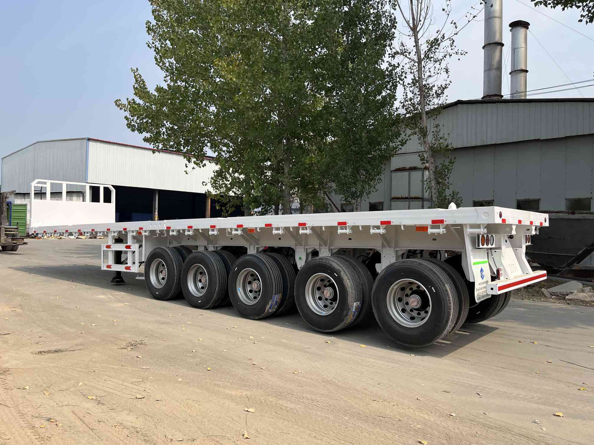 CIMC cheap 3 axles high Steel Cargo Hot Sale 20ft 40ft Container Chassis with lock Low Flat Deck transport Flatbed Semi Trailer