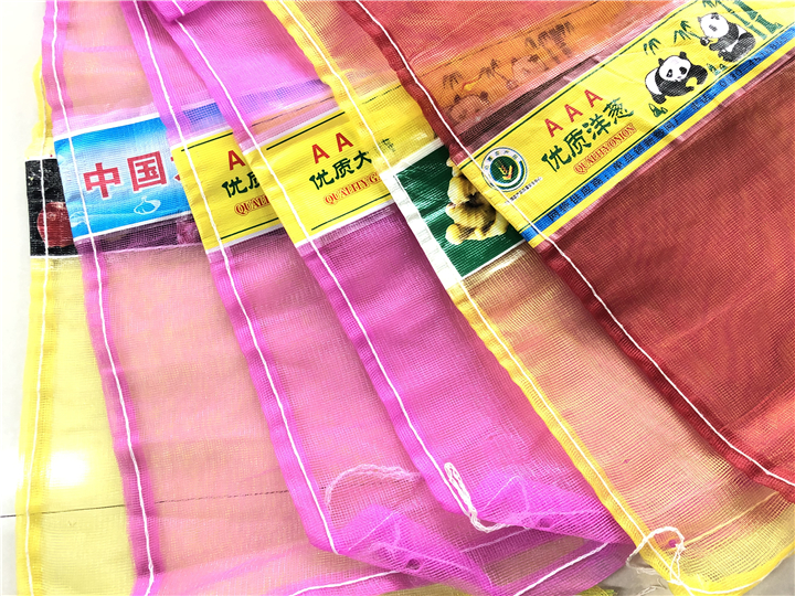 Fresh Garlic Packing Pp Fruit Pink Mesh Drawstring Bag Made of 100% PP/PE Material