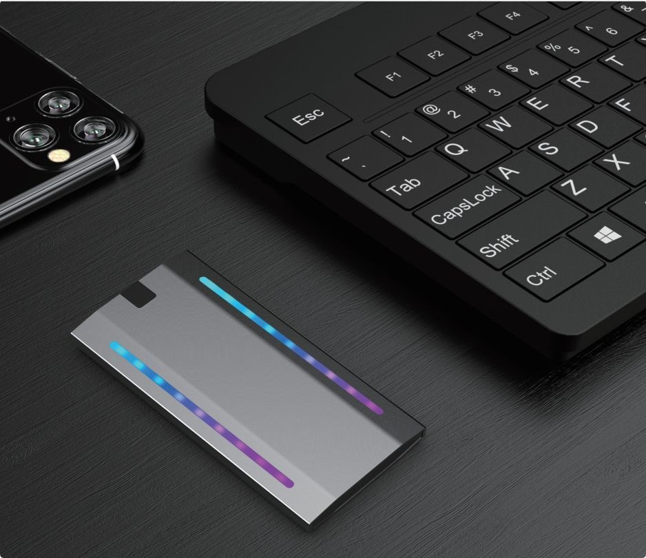 RGB Lighting Effect M. 2 SSD Mobile SSD Supports SATA and Mvne Protocols5gbps/10gbps Transmission Rate Glass Panel with Seven Colours RGB Light Effect