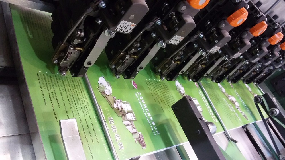 LD1050B Semi-Automatic Exercise Book Binding Machine Designed for High Volume Binding