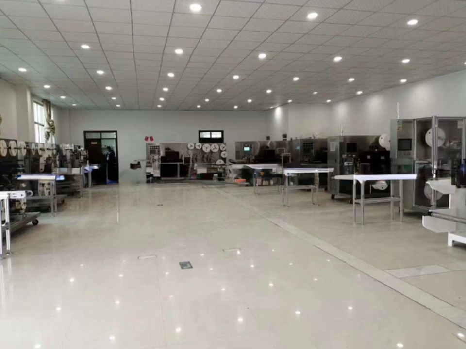 Fully Automatic KC-2000-B First Aid Making and Packing Machine Made with Release Paper