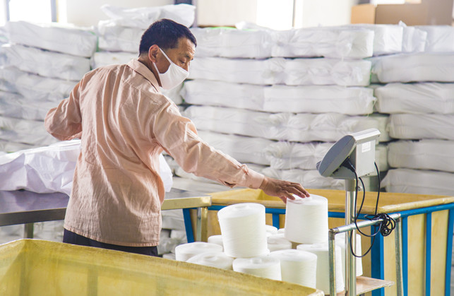 Polyester core spun sewing thread 45/2 with Excellent strength