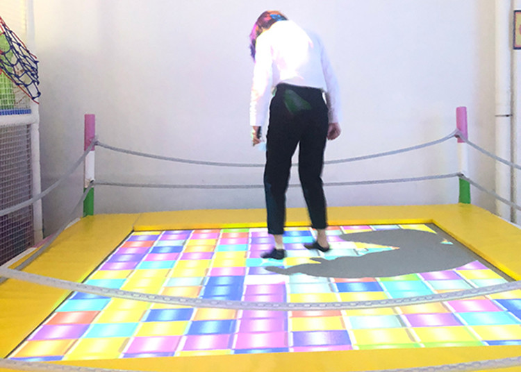 Dynamic Trampoline Interactive Projector Games with Camera Computer Integrated Host