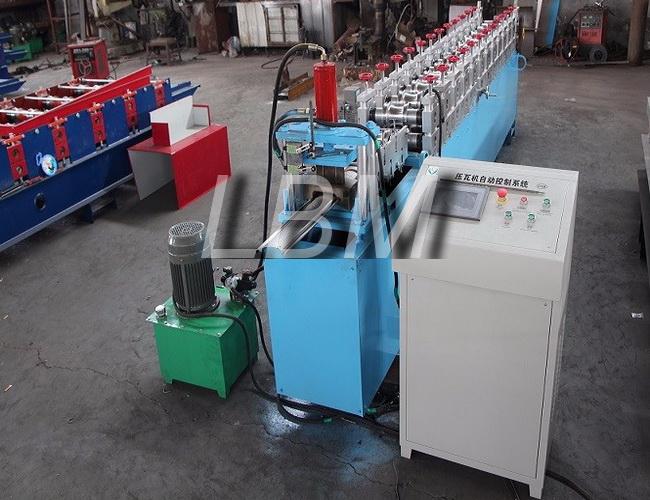 Grey color high hydraulic cut type door shutter roll forming machine full automatic 2018 new design