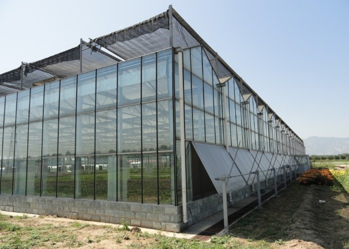 Automatic Control Intelligent Agricultural Glass Greenhouse For Sale Farm Cooling Shading Irrigation System