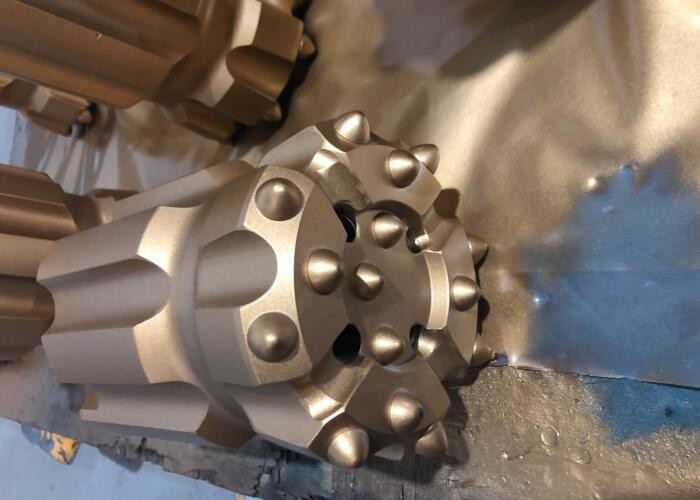 Drop Centre With Ballistic Buttons T45-5 Inch Retrac Bit In Bench Drilling