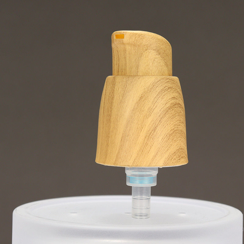 Outer Spring Airless 0.25cc Plastic Lotion Pump Hand Lotion Pump With Wood Grain