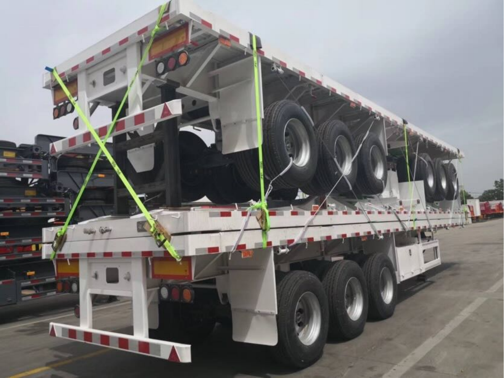 CIMC cheap 3 axles high Steel Cargo Hot Sale 20ft 40ft Container Chassis with lock Low Flat Deck transport Flatbed Semi Trailer