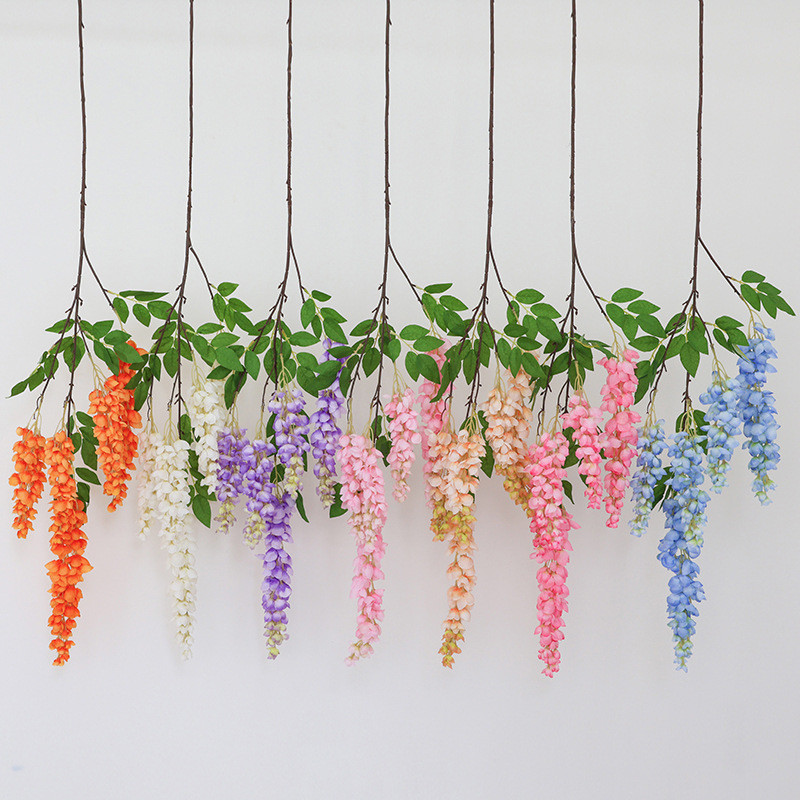 Simulation of giant wisteria flowers with long branches, plastic fake flowers, silk flowers, indoor living room, hanging rattan strips, photography