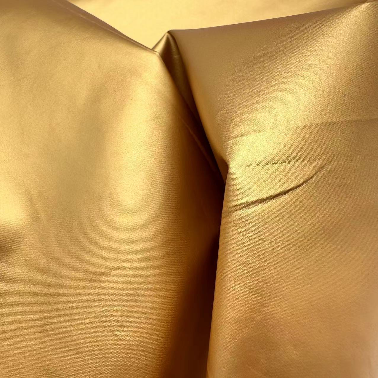 100% Polyester 104GSM Outdoor Jacket Fabric Water Resistant With Gilded Gold Fabric