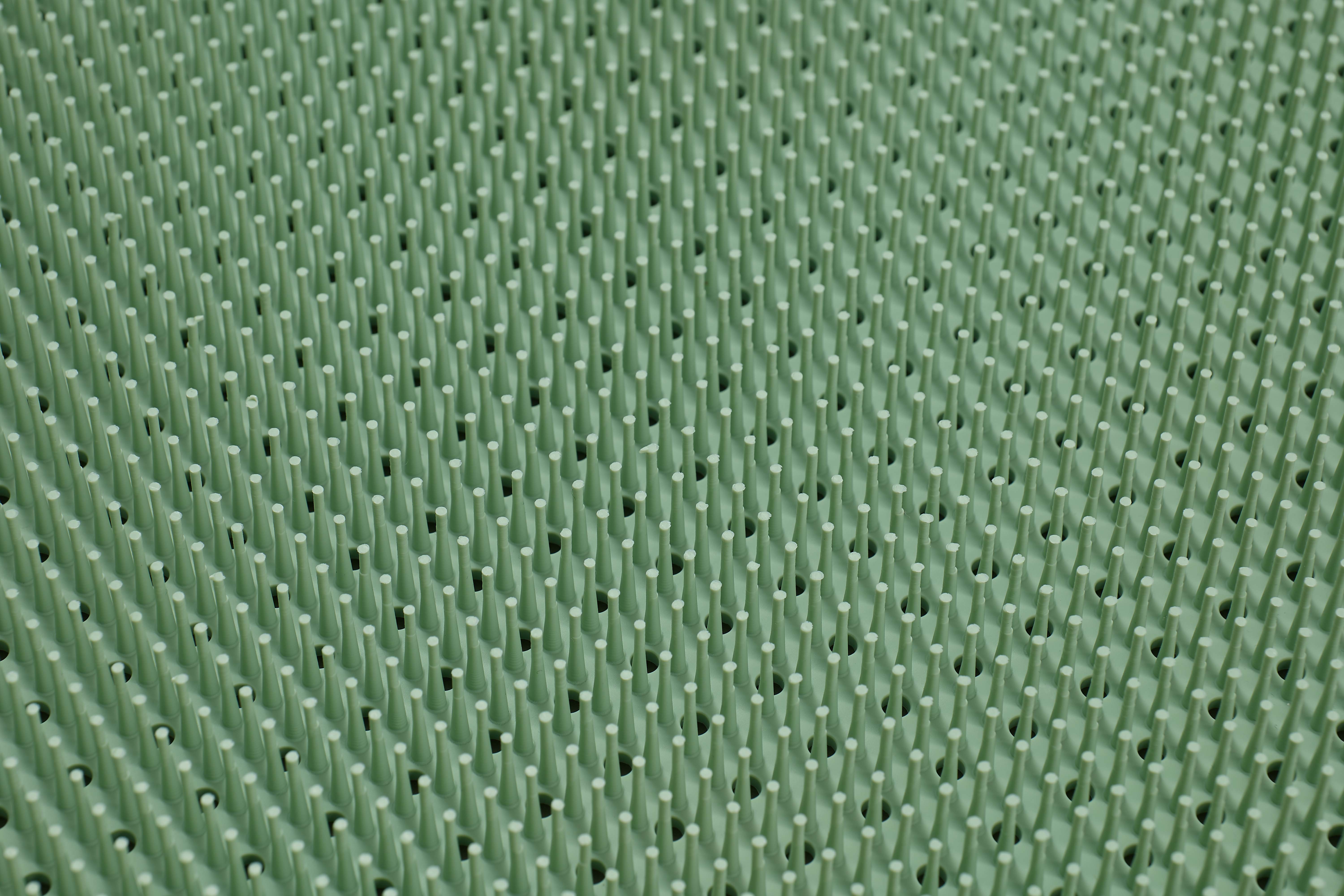 Non toxic and non slip silicone shower foot massage pad in the gym bathroom