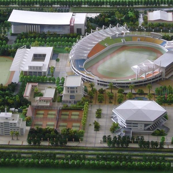 Architectural Model of a Sports Complex with Stadiums, Courts, and Landscaped Areas for Presentations