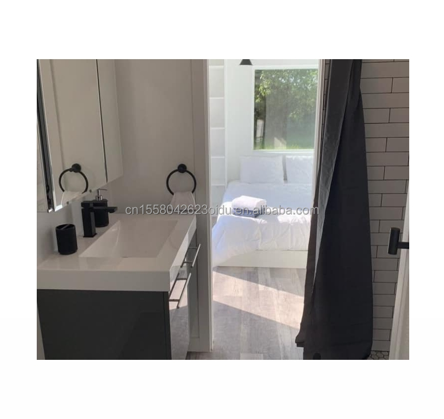 50/75/100mm Wave Sandwich Panel Wall Customizable Design 40ft Modified Shipping Container House for Living or Vacation