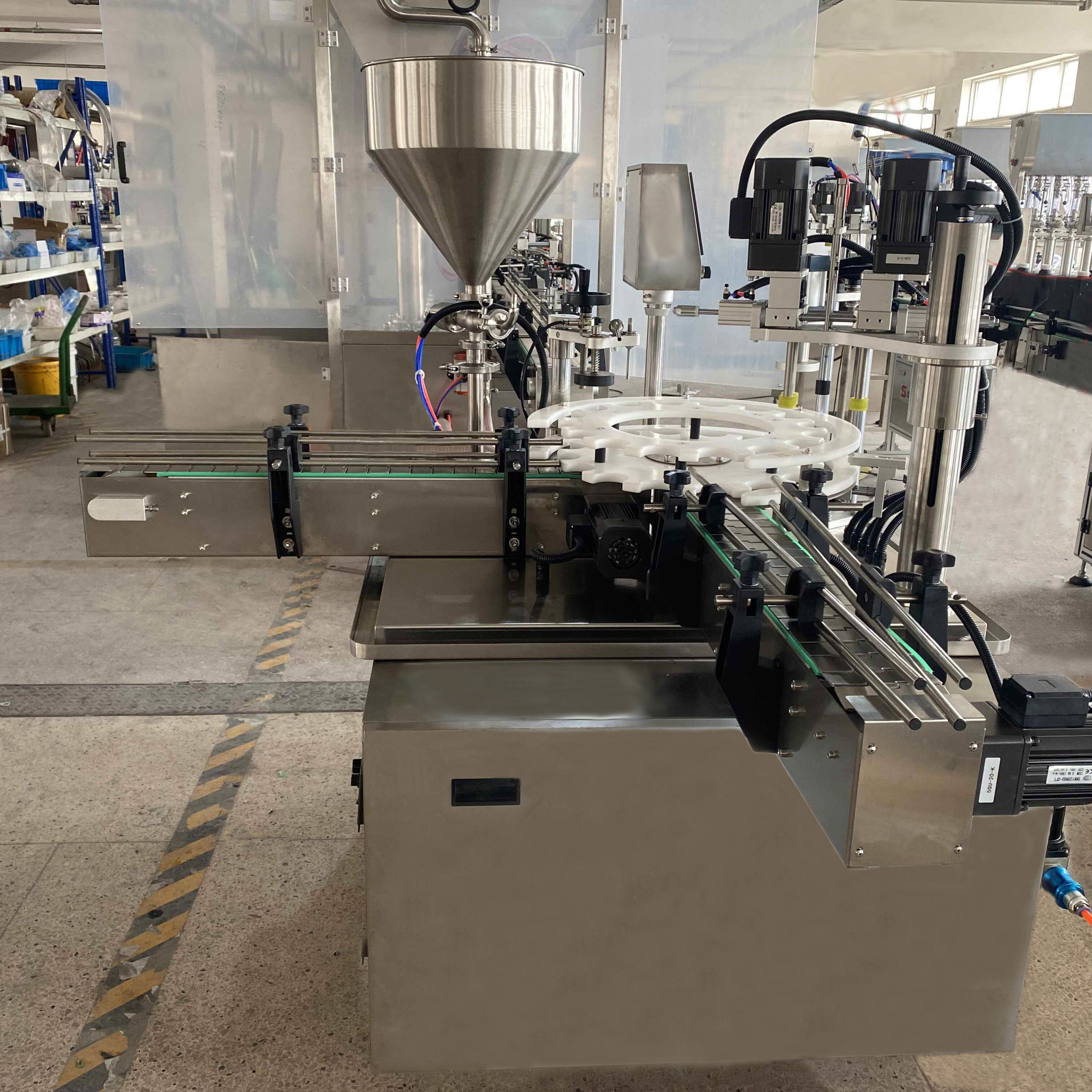 High Efficiency Filling And Precise Capping Automatic Duck Bill Cap Filling And Spinning Machine