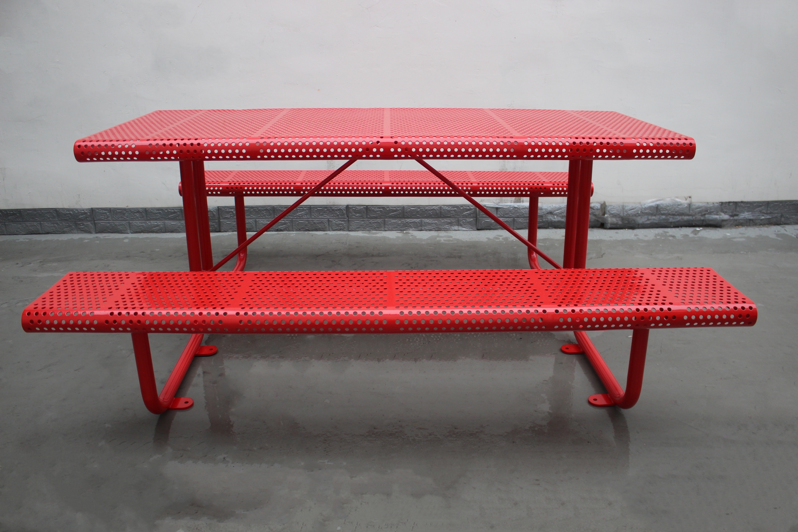 mild steel picnic table, perforated steel table top and seat pans,one table with two benches,surface mounted