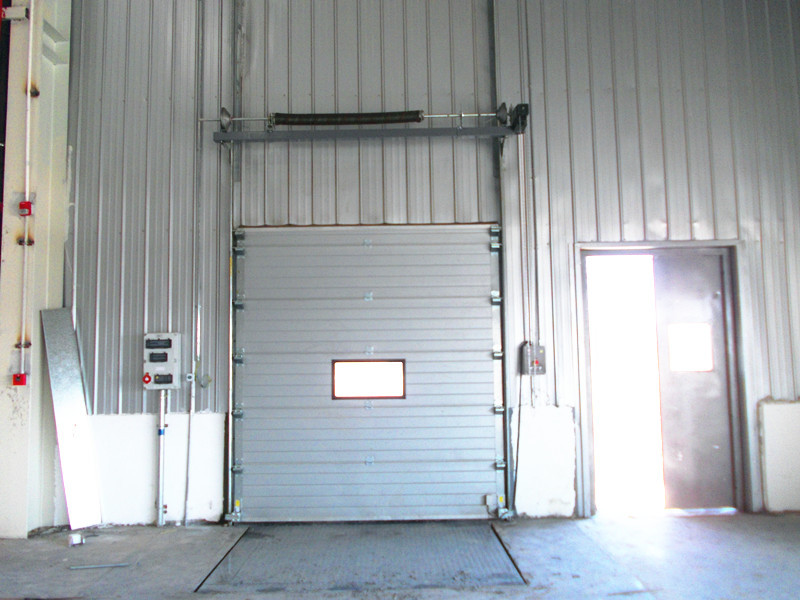 Outside Galvanized Steel Frame Industrial Sectional Doors With High frequency Motor