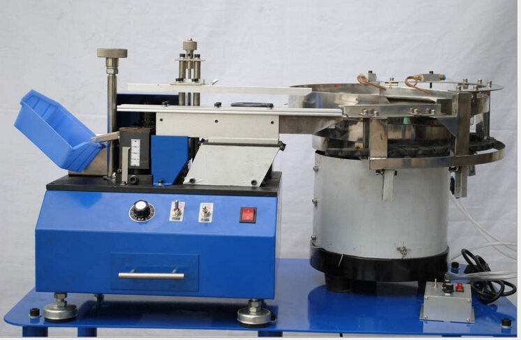 Capacitor lead cutting machine