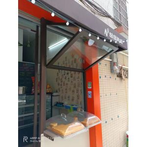 Companion Hearth Adjacent Folding Window Providing Supplemental Ventilation