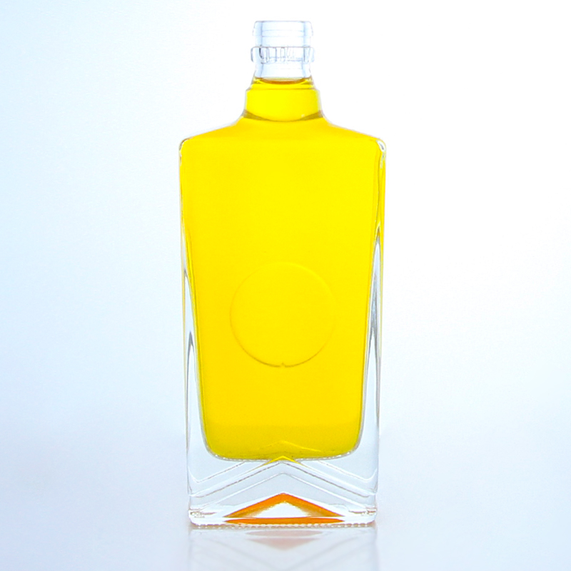 Industrial Liquor square glass bottle with guala cap and customizable capacity
