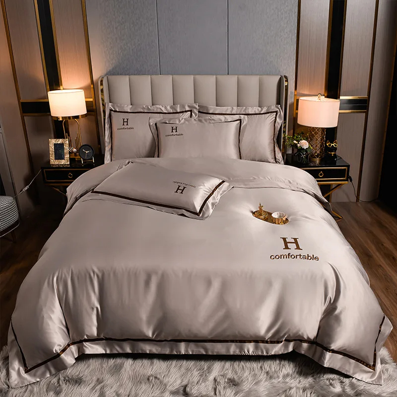 Home Polyester Luxury Embroidered Washing Silk Bedding Set with Solid Color Duvet Cover