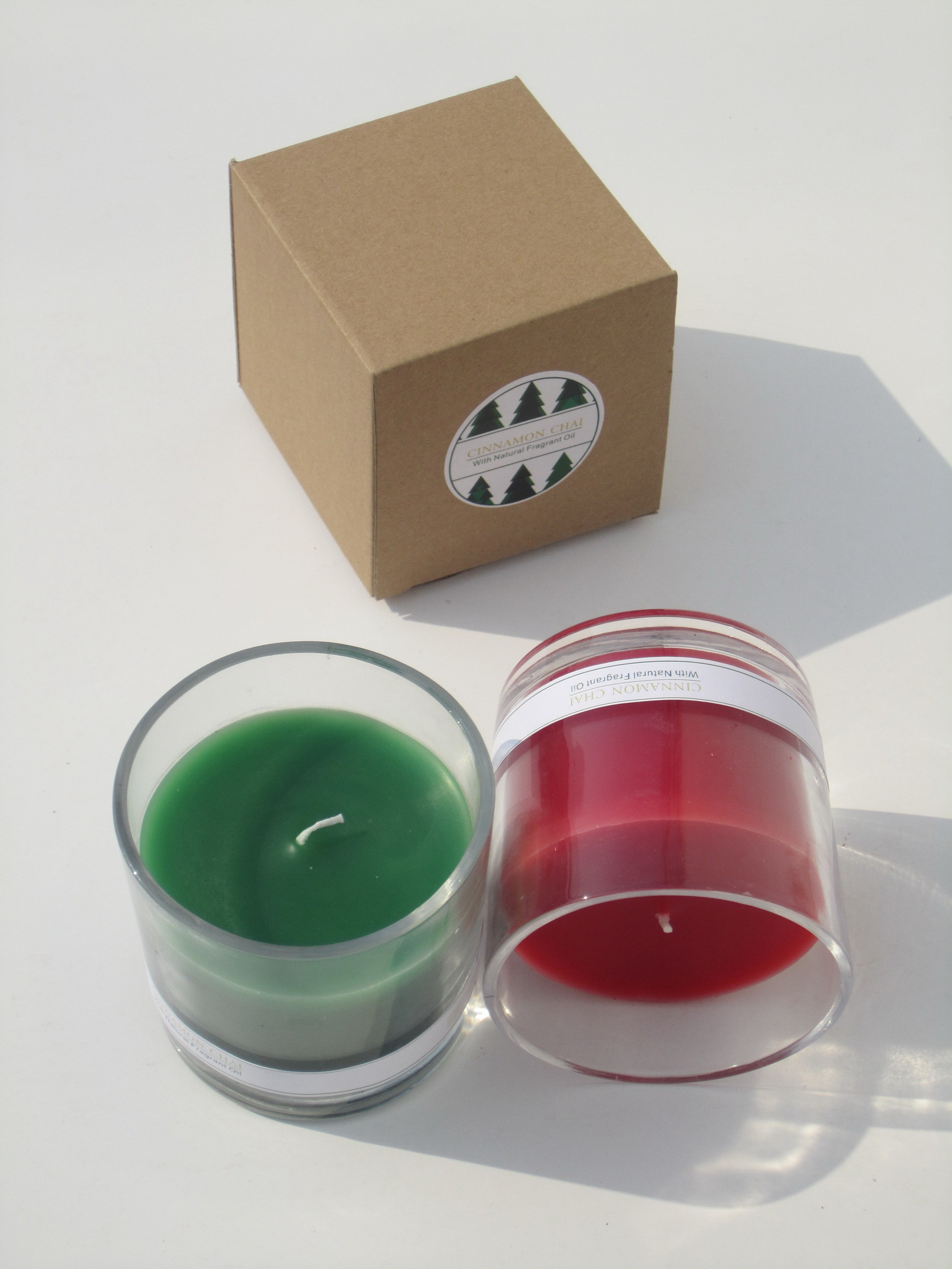 Red & Green round scented glass candle with printed label and packed into gift box