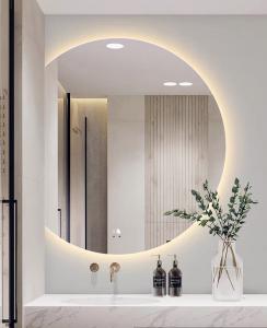 China Hotel Bathroom Vanity Wall Half Round Mirror Customized Led Backlit Defogger on sale