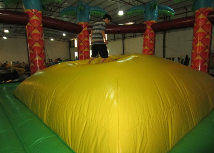 Inflatable soft moutain sport game inflatable jumping hill with safety net