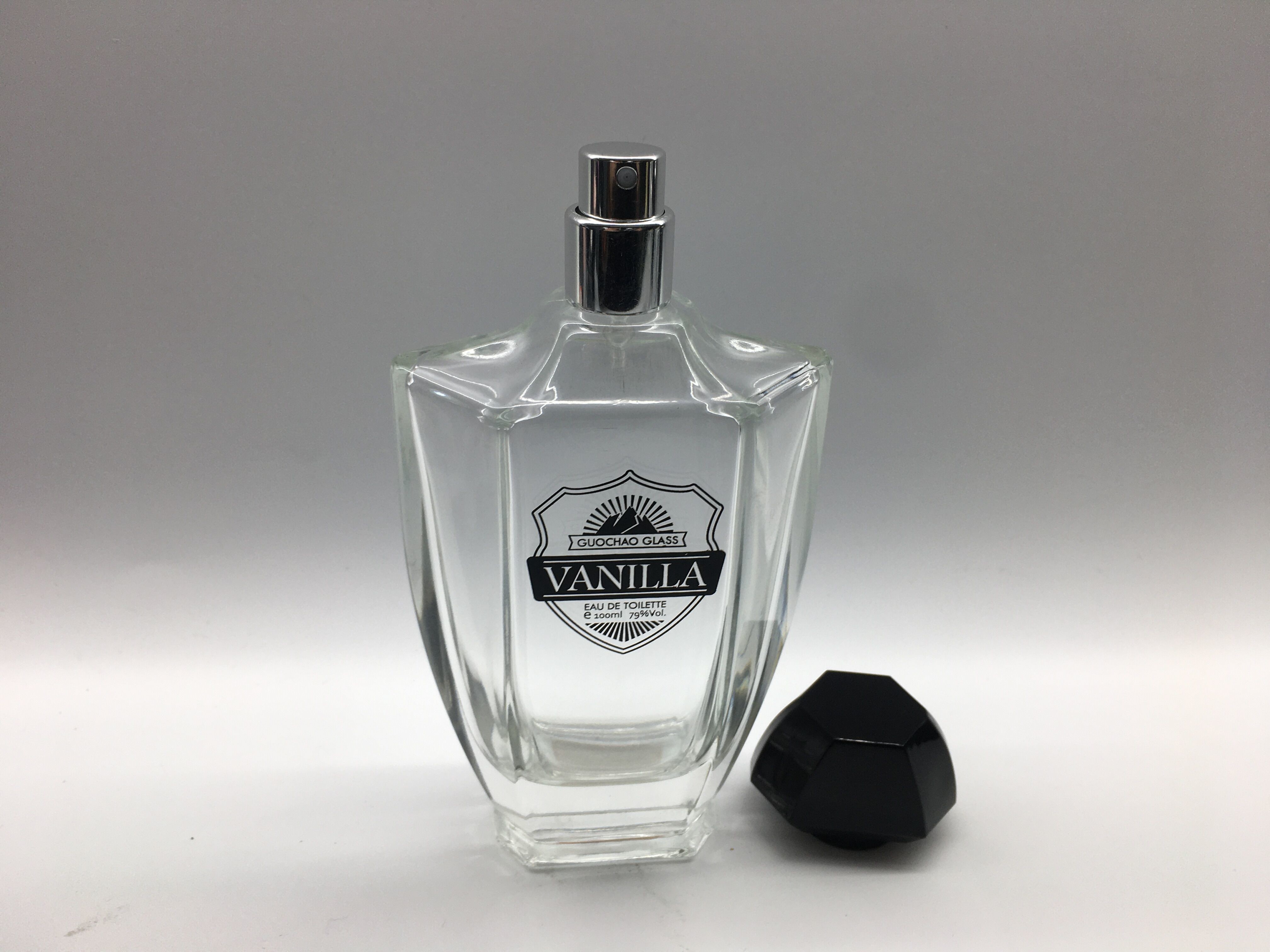 Irregular Cap Luxury Perfume Bottles OEM 100ml Clear Glass Atomizer Sprayer