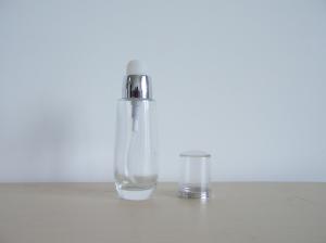 China 25ml Spraying Empty Glass Bottles for Foundation Cosmetics with WT Pump & Cap on sale