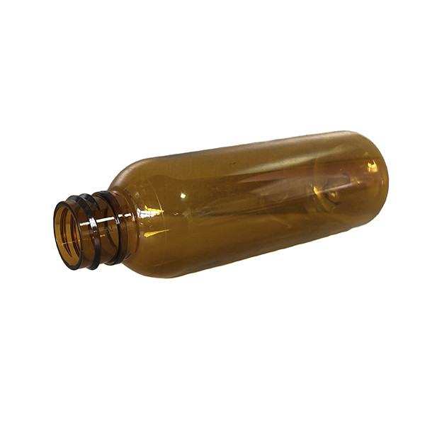 2 Oz Round Squeezable Clear Brown PET Bottle With Spray Pump 20/410