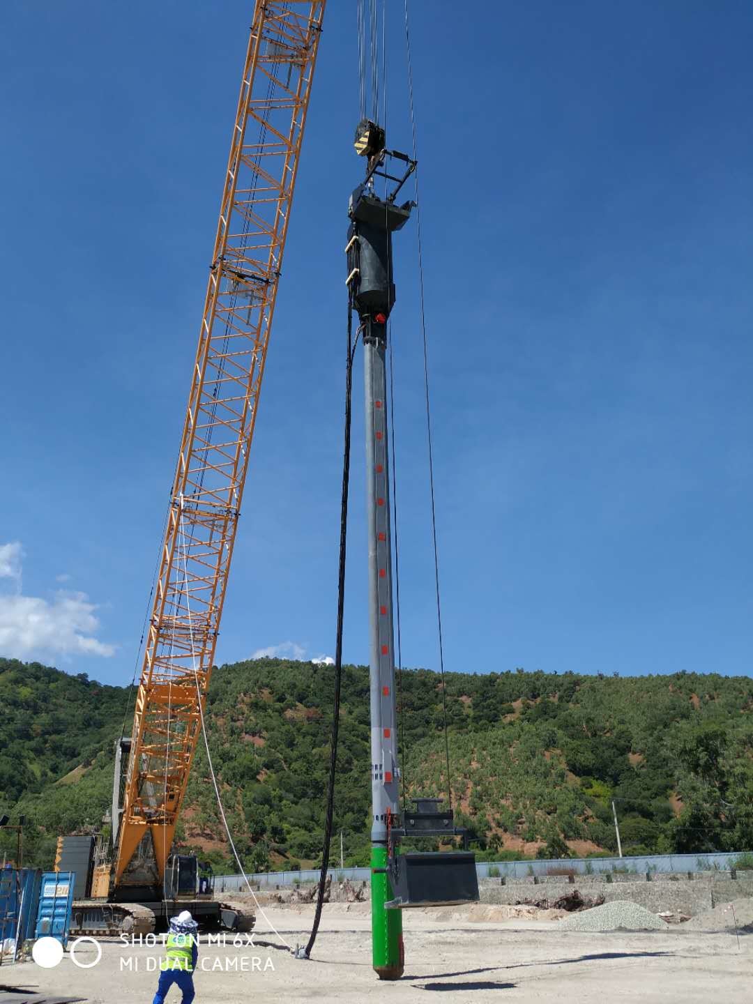 Bottom Feed Vibroflot System In Reclamation Island Dry Method