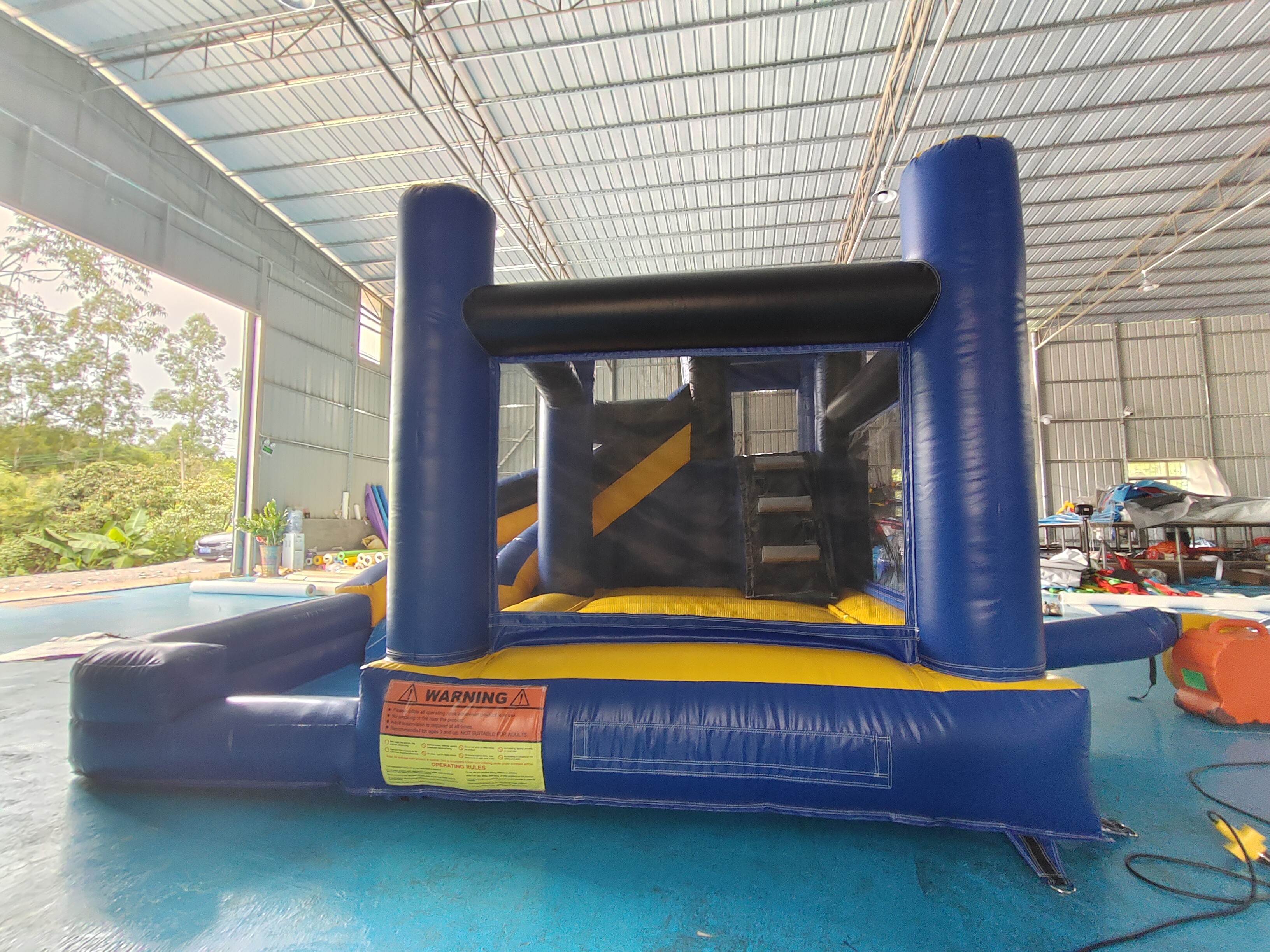 Fireproof Commercial Inflatable Bouncer Moonwalk Cartoon Theme With Rotary Slide Combo