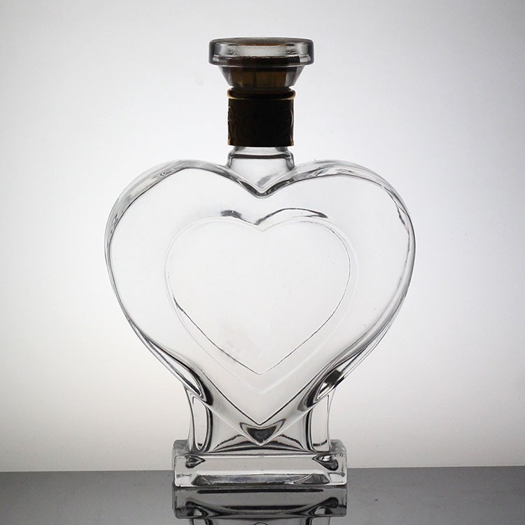 Custom Made Heart Shaped Glass Bottle With Crown Cap And Lid Unique Design