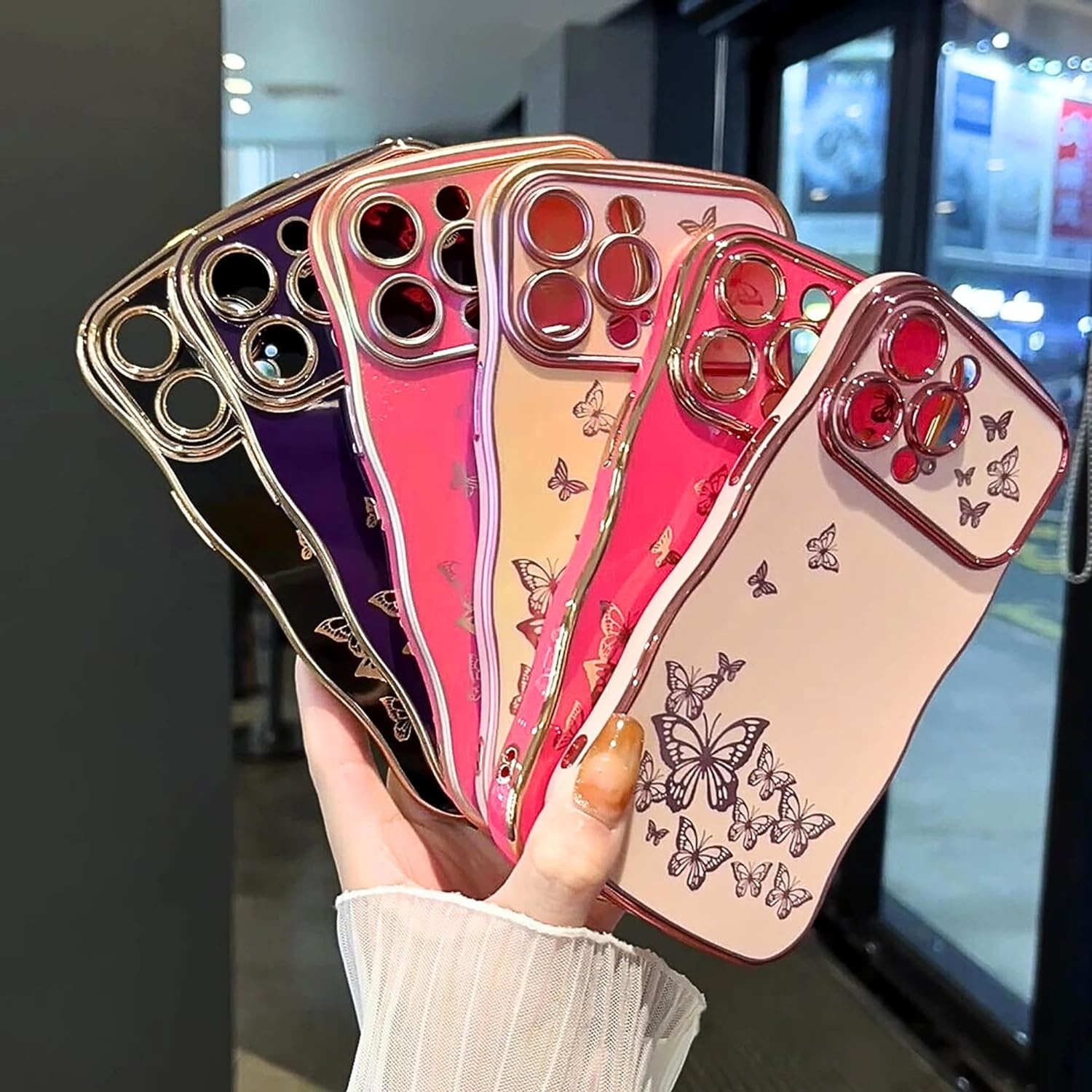 iPhone 13 girl phone case, curly wave frame, luxury plated butterfly pattern, TPU gold rim shock-proof lens protection