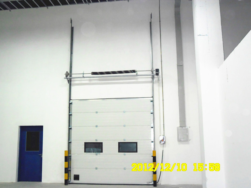 Outside Galvanized Steel Frame Industrial Sectional Doors With High frequency Motor