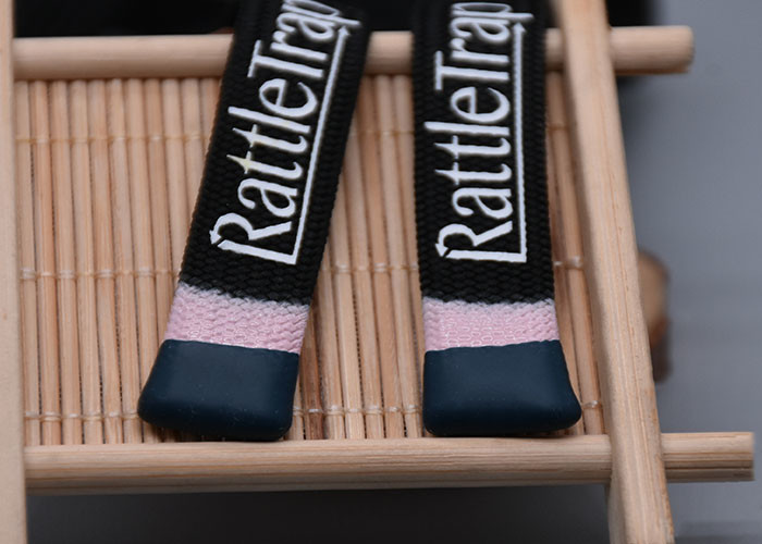 Customized 12mm Elastic Drawstring Cord Renewable Black Hollow With Silk Screen Drop Silicone Tip