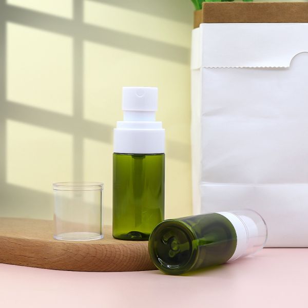 Green PET Plastic Spray Bottle with Light-blocking Leak-proof and Refillable Design for Cosmetic Skin Care